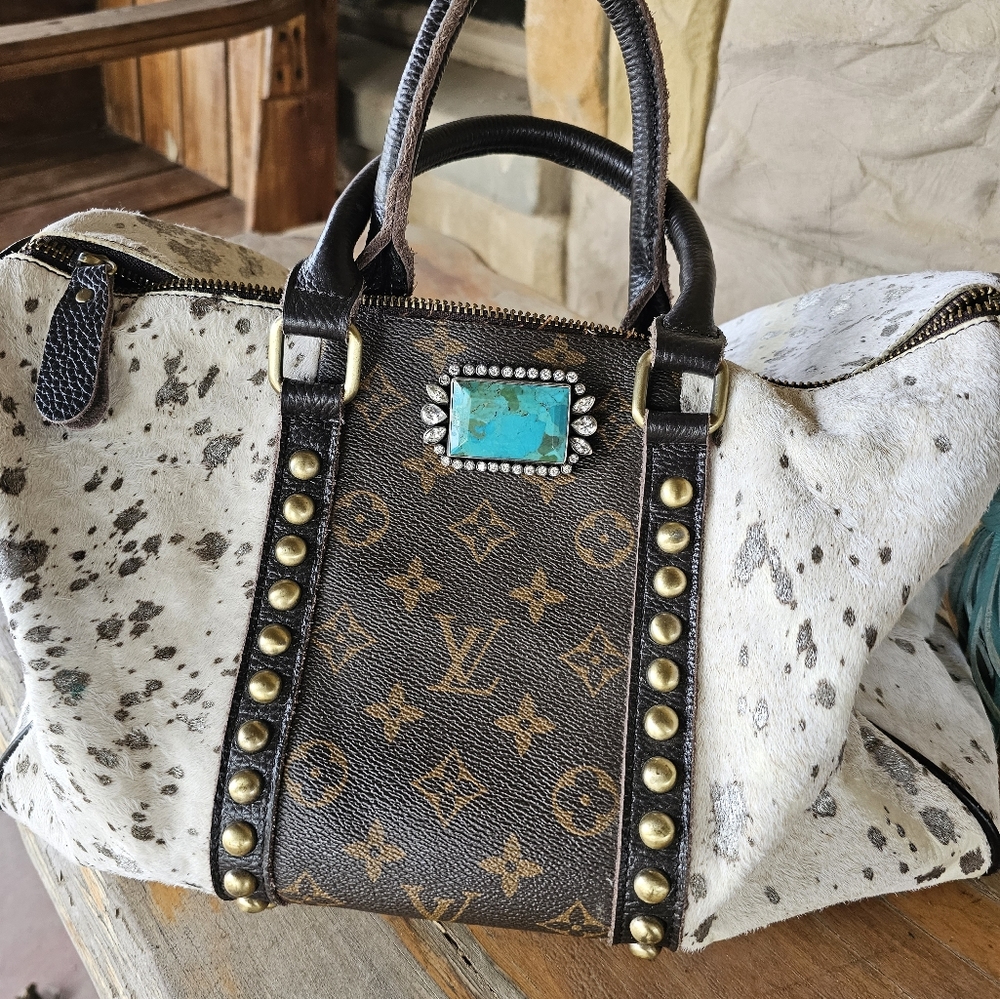 ACID WASHED cowhide speedy bag with LV insert.